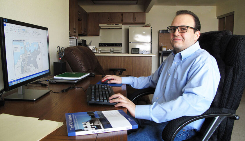 An ABLE volunteer working from his home. Volunteers are the heart of our work.