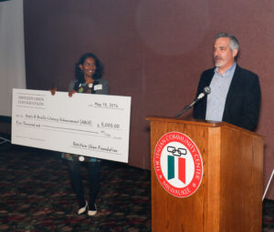 Sujatha Aswath and Bob Norman from Eppstein Uhen Architects presenting the first $5K installment of our grant.